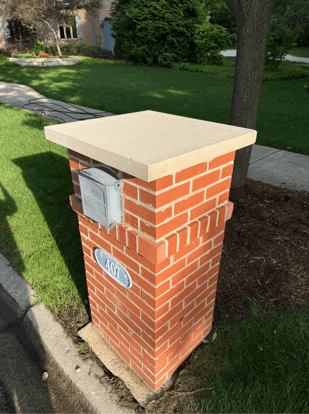 Clean brick mailbox post with restored cap after Bin Bros mailbox cleaning in Elmhurst, IL